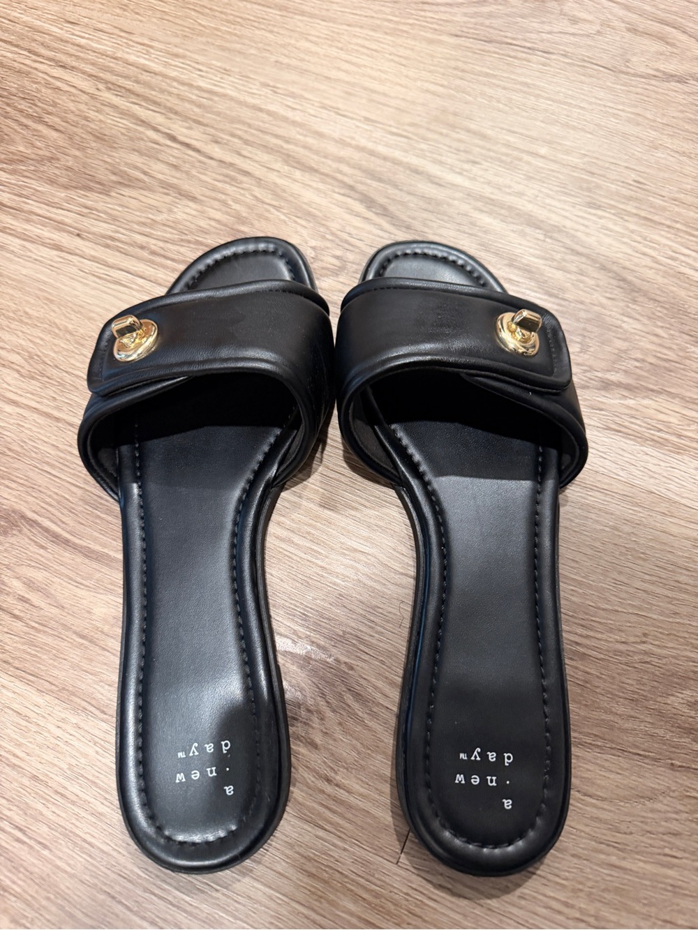 a new day Black Slide Mules with Gold Hardware